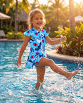 ZipMAE Swimwear Coconut Cove swimsuit featuring a vibrant tropical print on a flattering one-piece design.